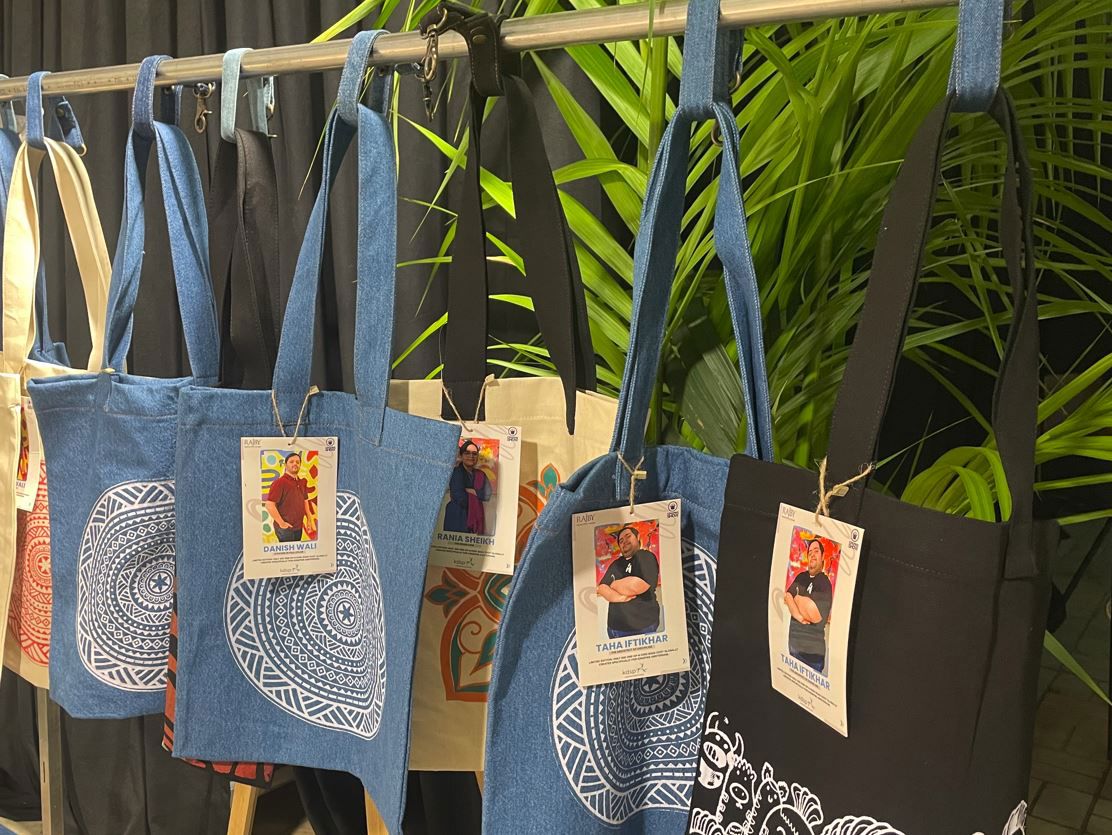 Rajby’s art-covered totes bring joy to Kingpins